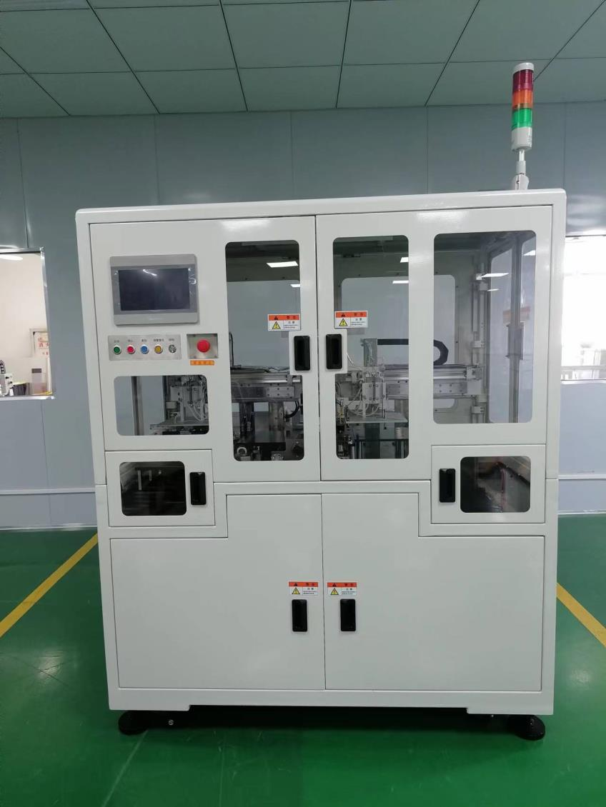 自動(dòng)貼膠機(jī)